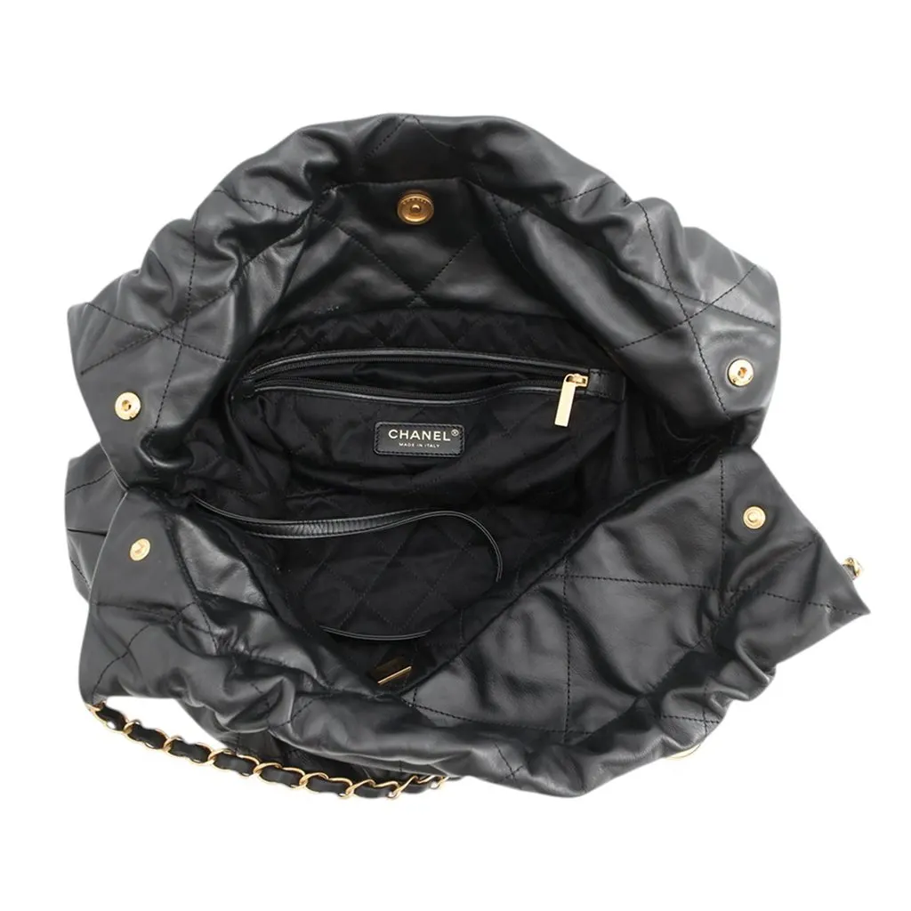 Chanel Medium Quilted Shiny Calfskin 22 Handbag Black Leather Very good - Model View