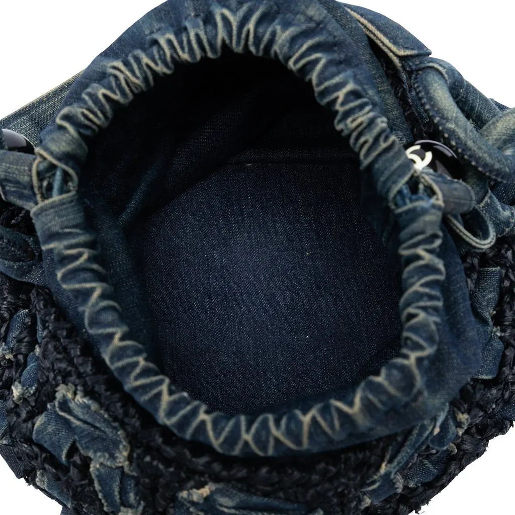 Chanel CC Woven Denim and Raffia Drawstring Bucket Bag Blue Very good - Model View