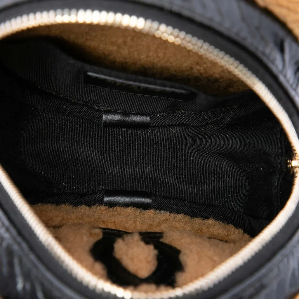 Chanel Shearling Trimmed Shiny Crumpled Sheepskin Round Clutch with Chain Black Leather Good - Model View