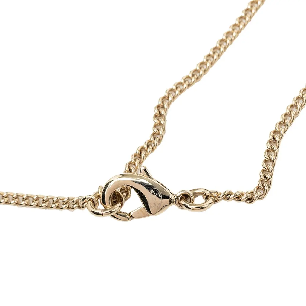 Chanel CC Gold Plated Faux Pearl and Strass Deer Pendant Necklace Gold Metal Very good - Box View