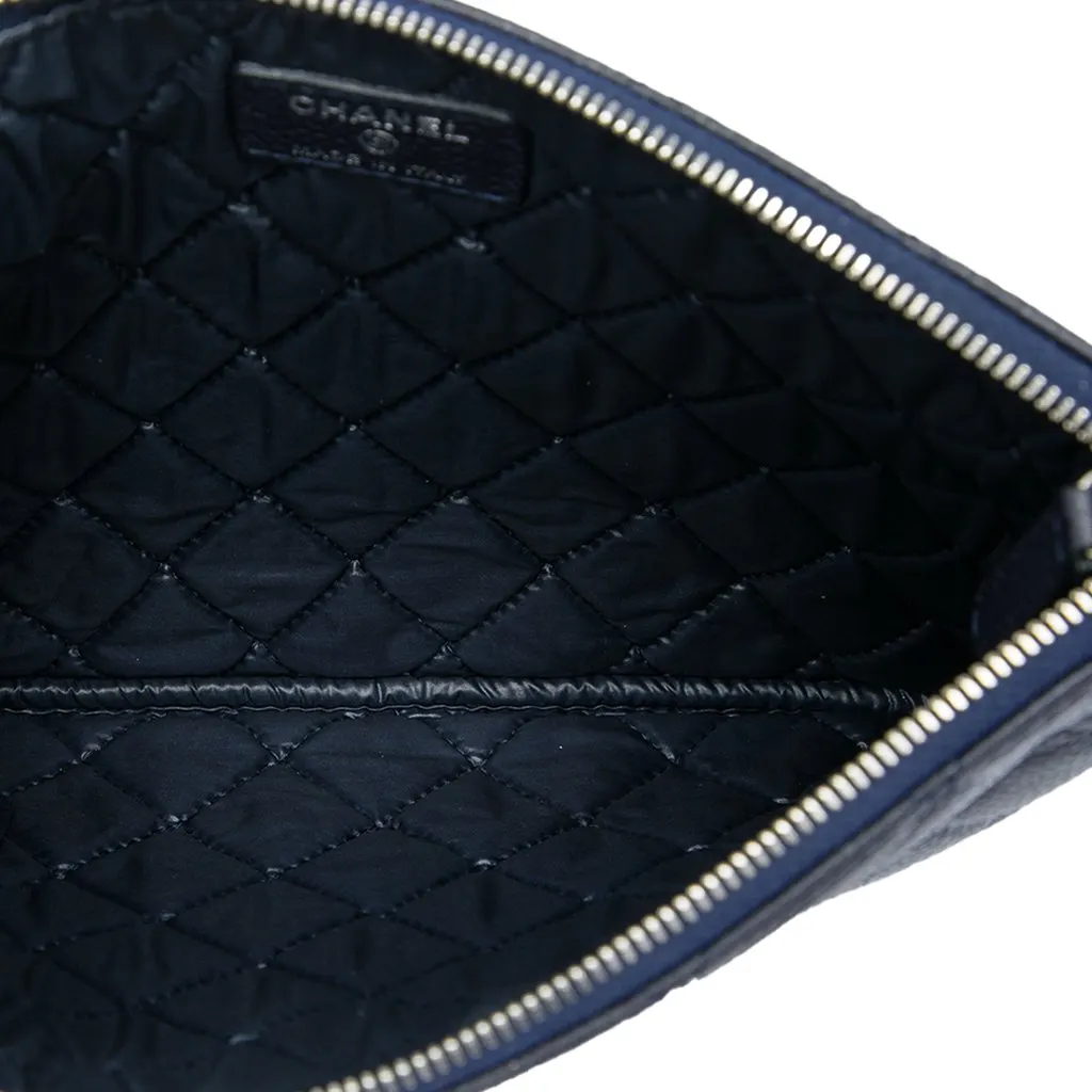 Chanel Small Quilted Caviar O Case Clutch Blue Leather Good - Model View