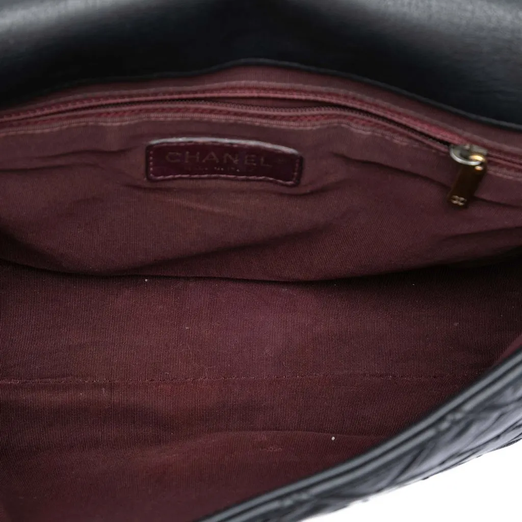 Chanel Large Diamond Debossed Calfskin Reissue 2.55 Cosmos Flap Black Leather Very good - Model View