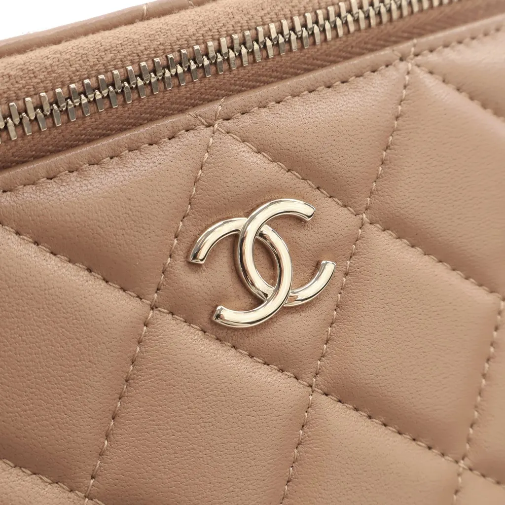 Chanel Small CC Quilted Lambskin Top Handle Vanity Case with Chain Beige Leather Very good - Model View