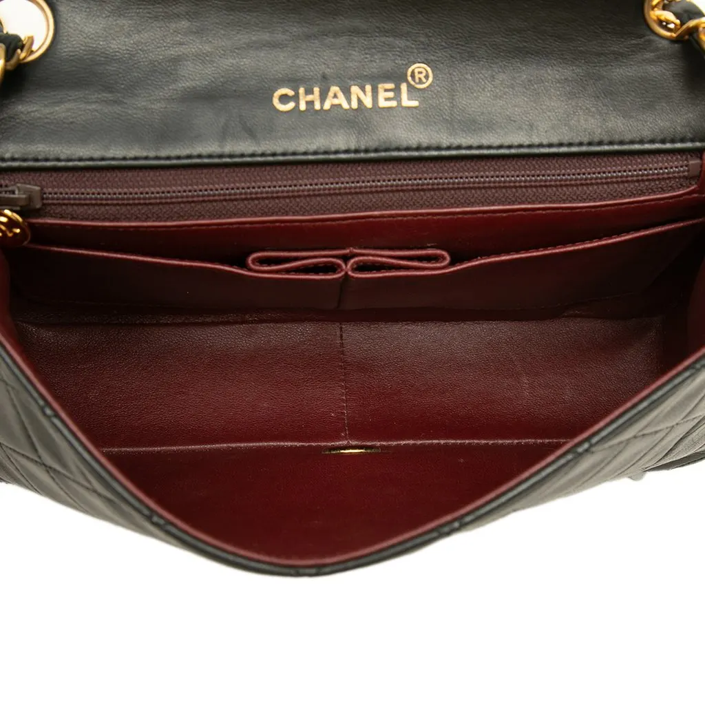 Chanel Small CC Quilted Lambskin Full Single Flap Black Leather Good - Model View