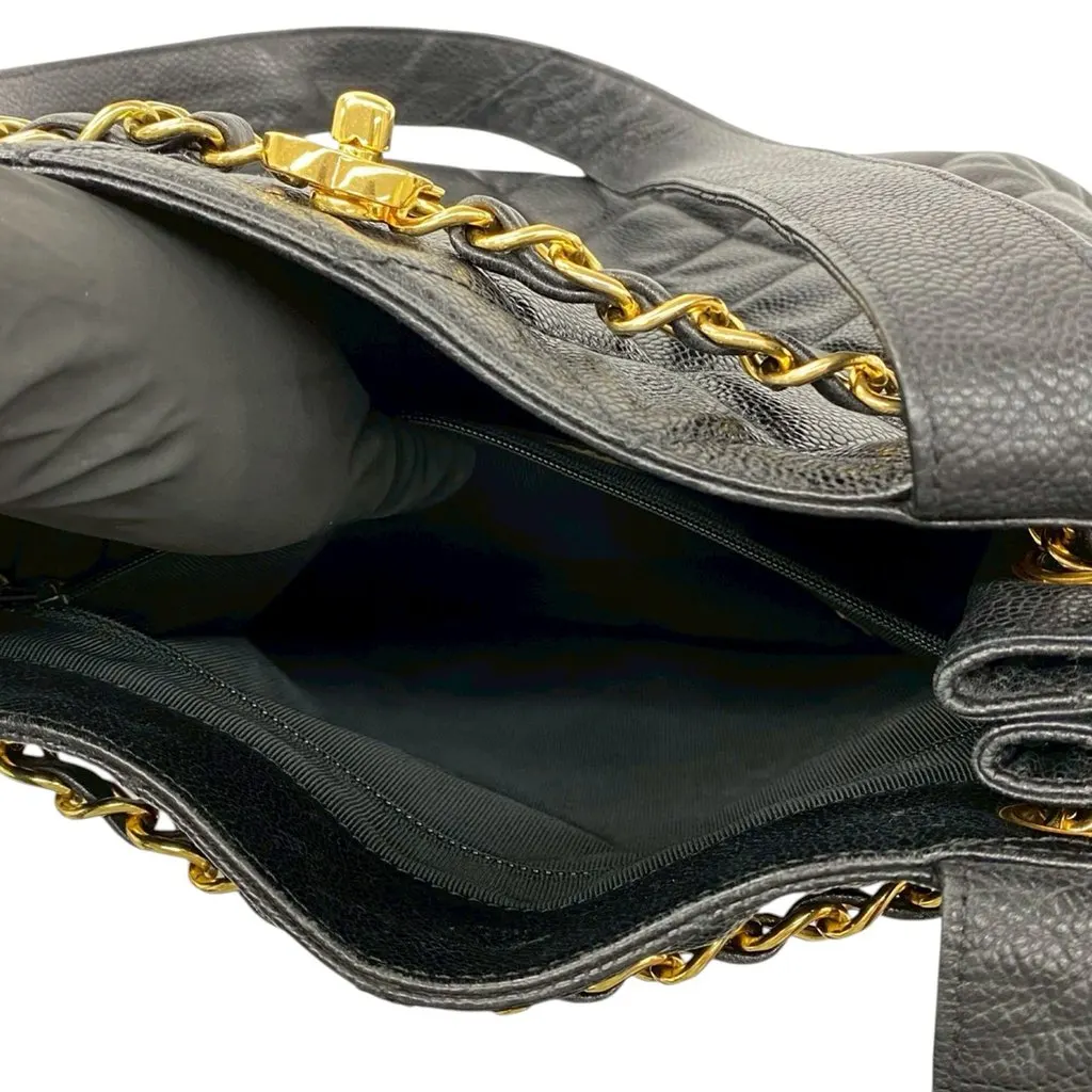 Chanel CC Quilted Caviar Chain Drawstring Tote Black Leather Very good - Model View