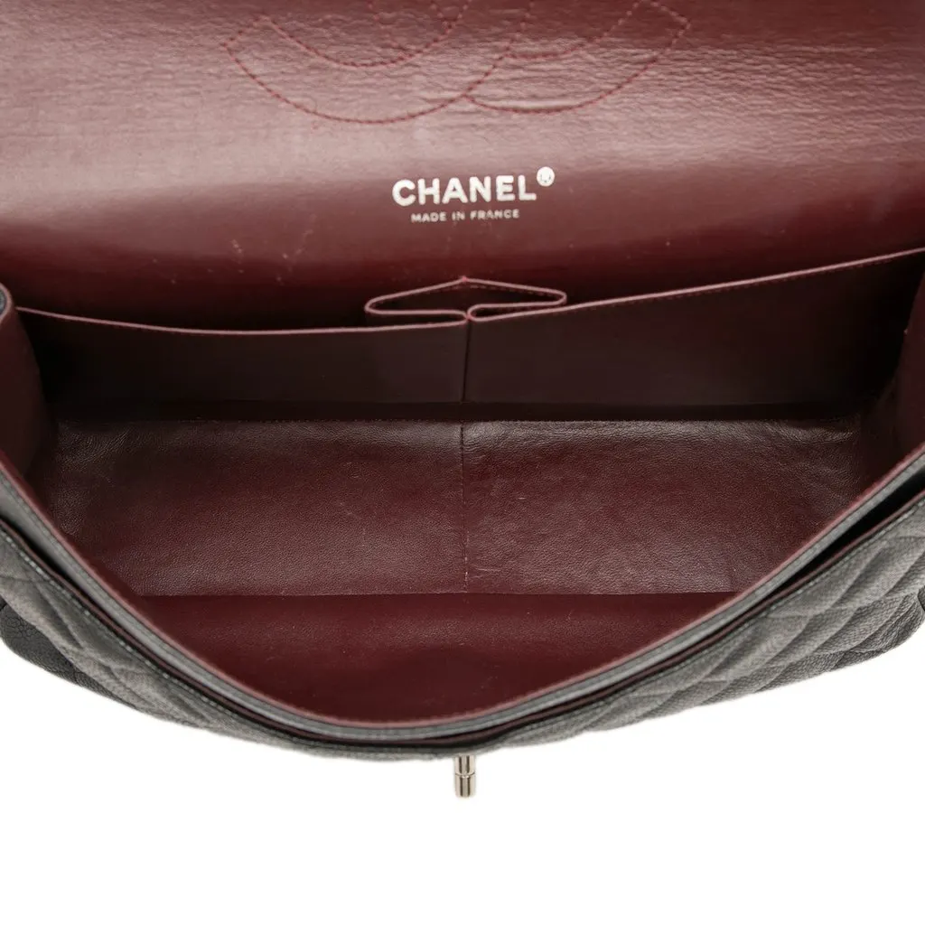 Chanel Jumbo Classic Caviar Double Flap Black Leather Good - Model View