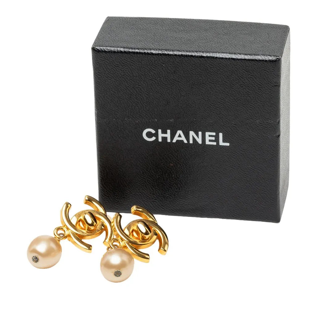 Chanel CC Gold Plated Faux Pearl Drop Turn Lock Clip On Earrings Gold Metal Very good - Model View