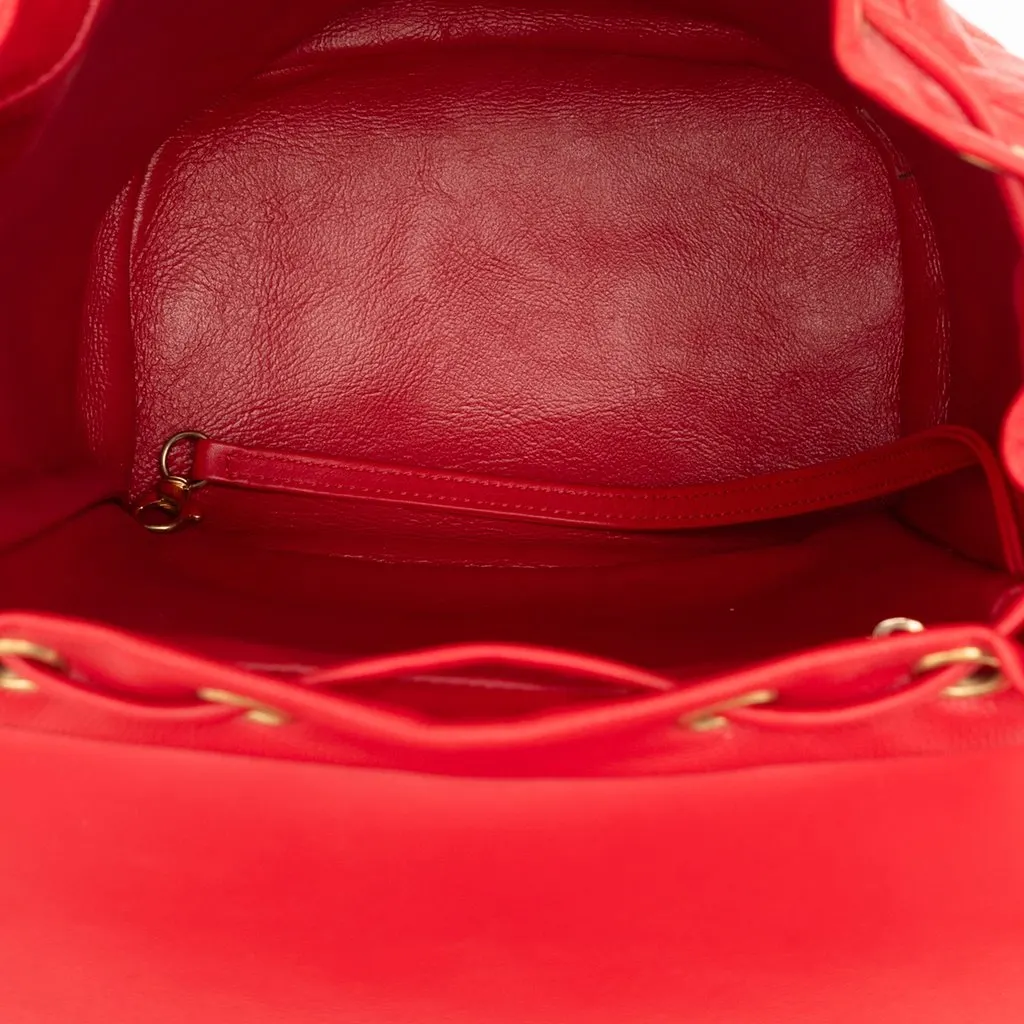 Chanel Quilted Caviar CC Filigree Backpack Red Leather Good - Model View