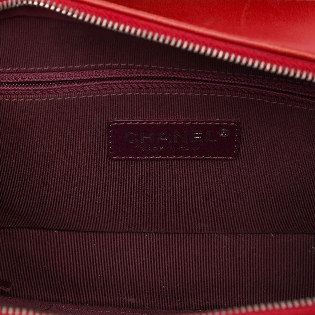 Chanel Small Quilted Lambskin Coco Boy Camera Bag Red Leather Good - Model View