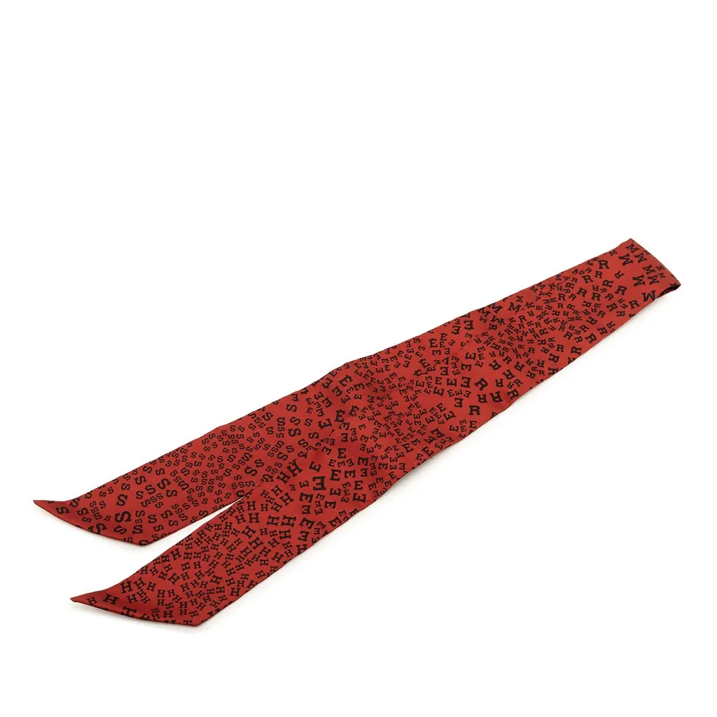 Hermès Scattered Letters Twilly Silk Scarf Red Never worn - Front View