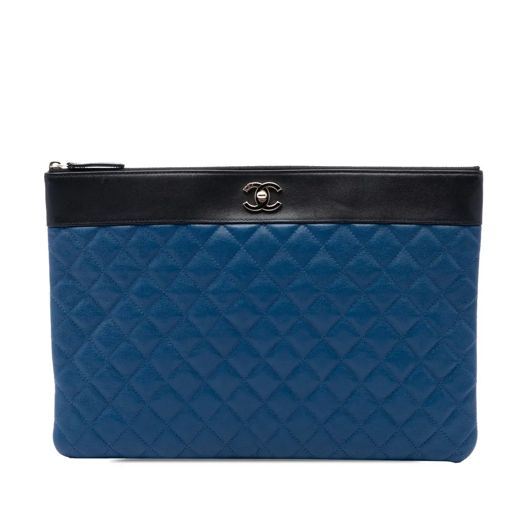 Chanel كبيرة Bicolor مبطّنة جلد الغنم Mademoiselle O Case كلتش