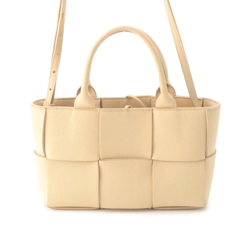 Bottega Veneta Small Lambskin Maxi Intreccio Arco Tote Beige Leather Very good - Model View