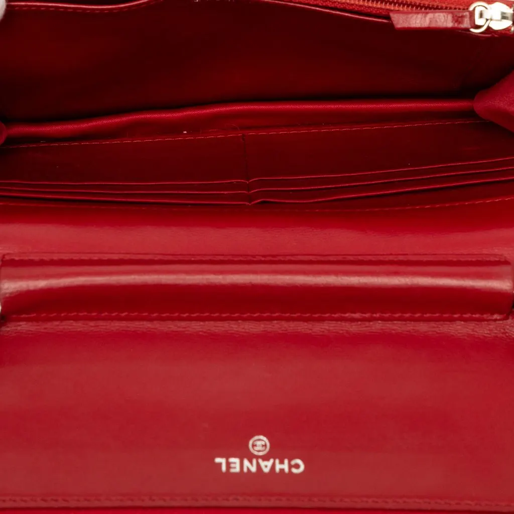 Chanel CC Embossed Lambskin Camellia Wallet On Chain Red Leather Very good - Model View
