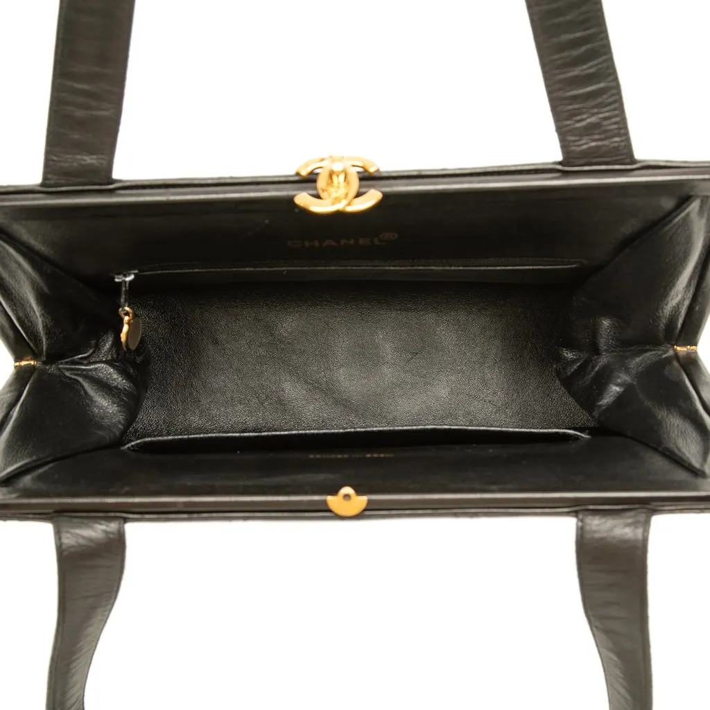 Chanel CC Quilted Lambskin Kiss Lock Frame Shoulder Bag Black Leather Good - Model View