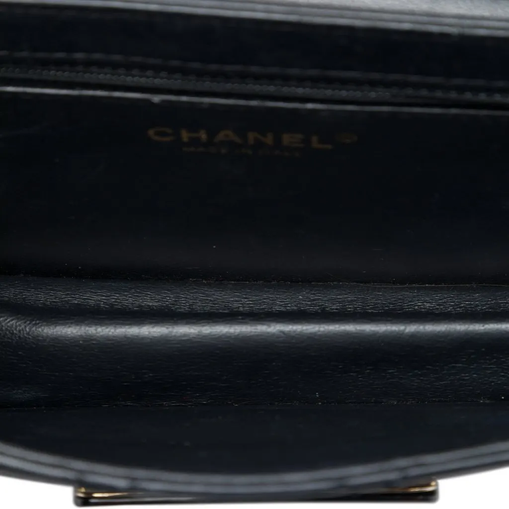 Chanel Mini Sheepskin Beauty Lock Flap Black Leather Good - Model View