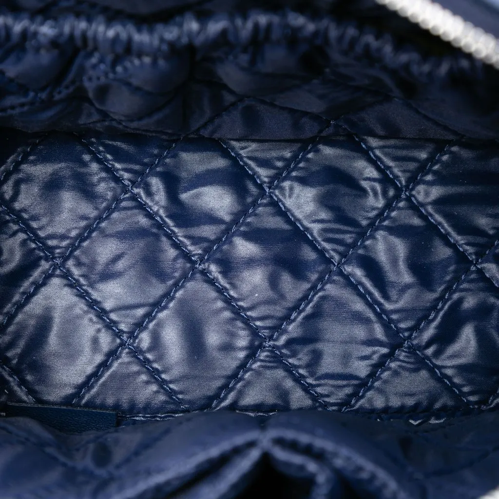 Chanel Large Quilted Lambskin Curvy Cosmetic Pouch Blue Leather Very good - Model View
