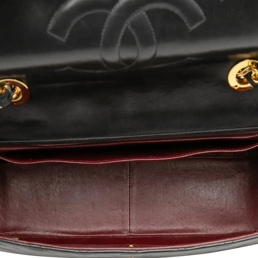 Chanel Maxi XL Classic Lambskin Single Flap Black Leather Good - Model View