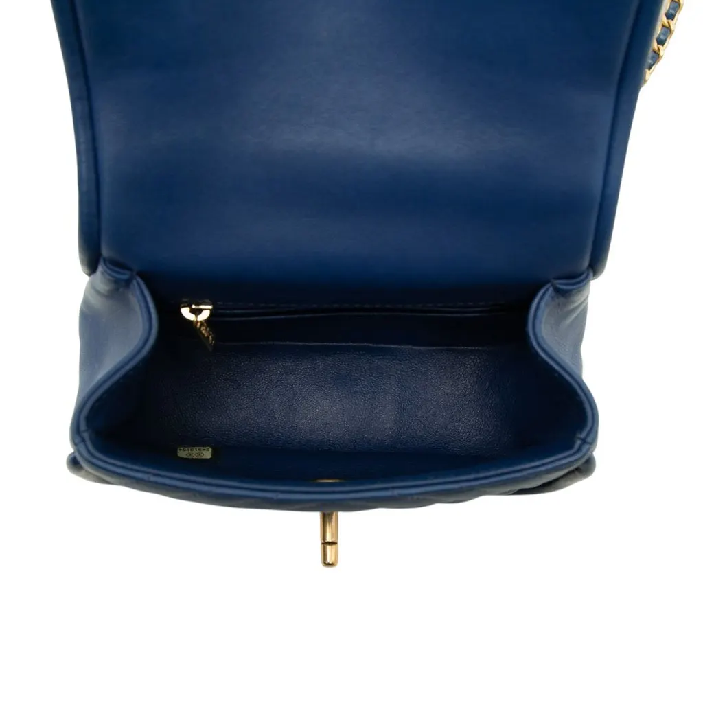 Chanel Mini CC Chevron Lambskin Reversed Round Flap Blue Leather Good - Model View