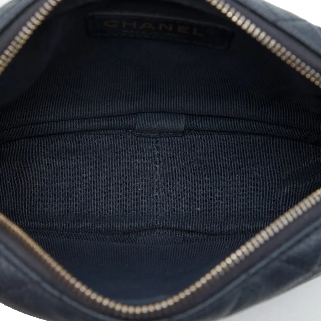 Chanel Mini Quilted Caviar Coco Tassel Camera Case Black Leather Very good - Model View