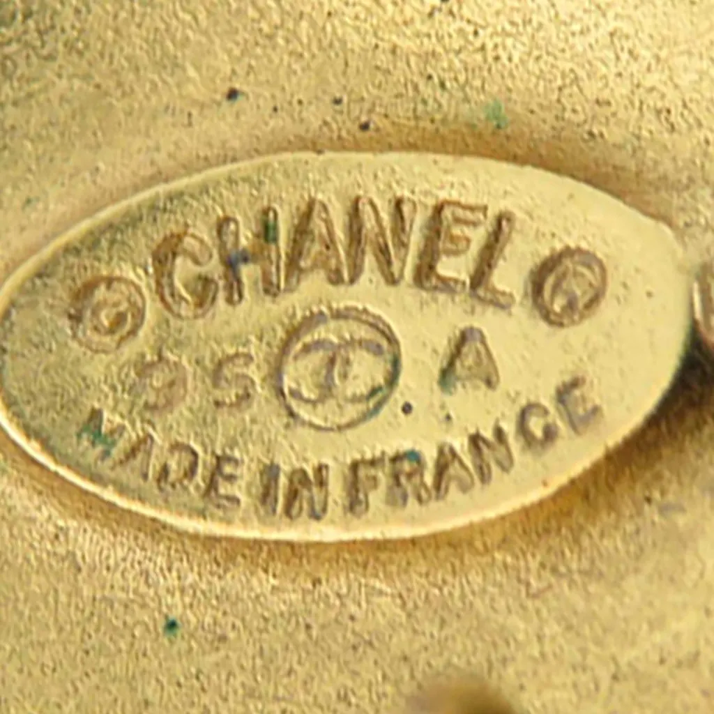 Chanel CC Gold Plated  Rhombus Clip On Earrings Gold Metal Very good - Model View