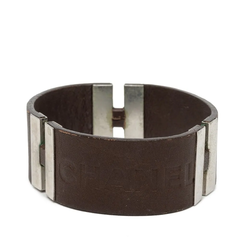 Chanel Debossed Leather and Brass Logo Cuff Bracelet Brown Leather Good - Front View