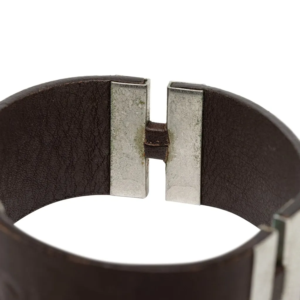 Chanel Debossed Leather and Brass Logo Cuff Bracelet Brown Leather Good - Box View