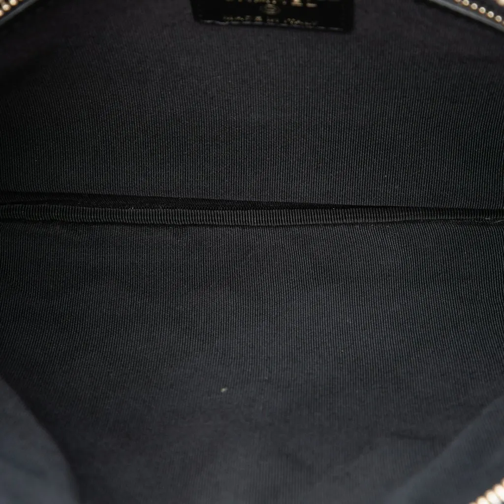 Chanel Medium Quilted Caviar Boy O Case Clutch Black Leather Good - Model View