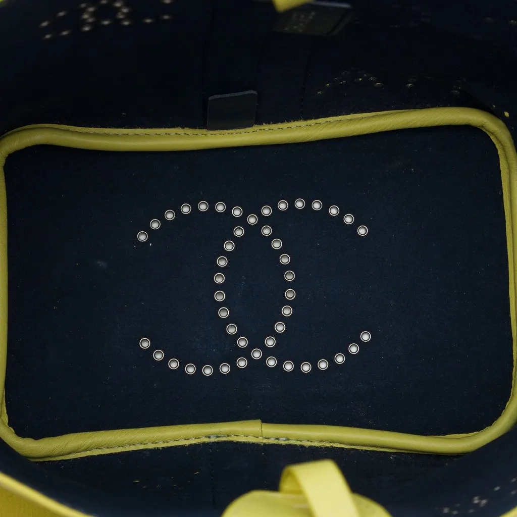 Chanel Small Perforated Calfskin Logo Eyelet Bucket Bag Yellow Leather Very good - Model View
