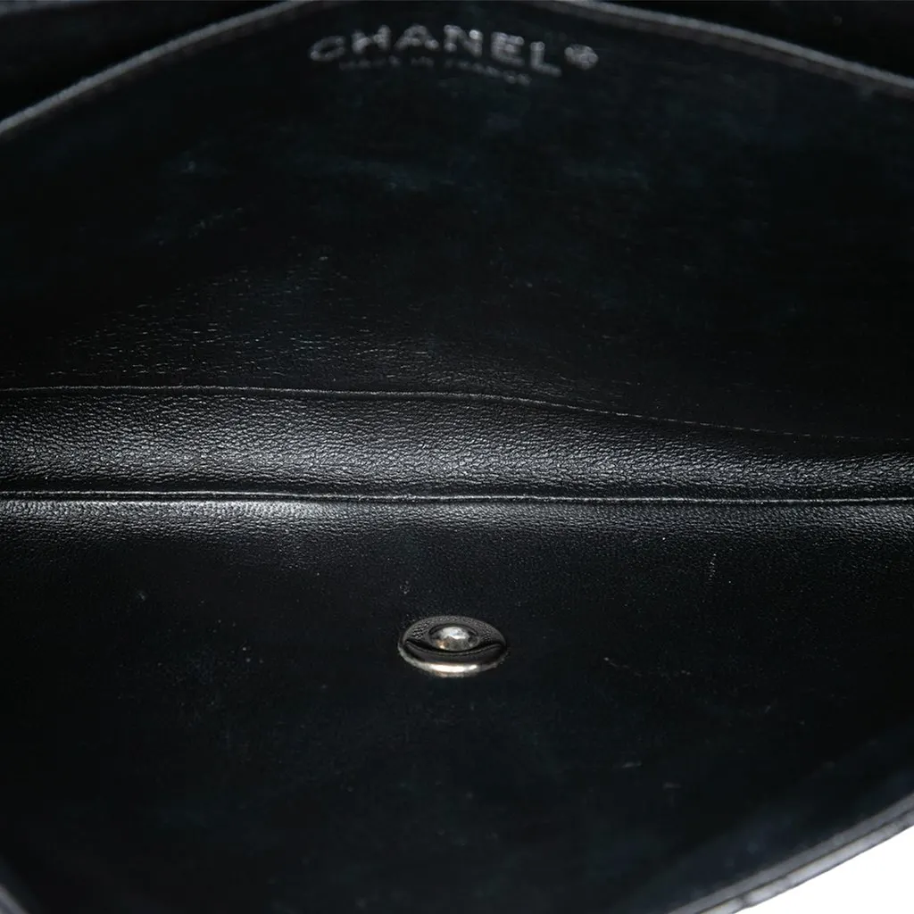 Chanel CC Quilted Patent Flap Clutch with Chain Black Leather Good - Model View