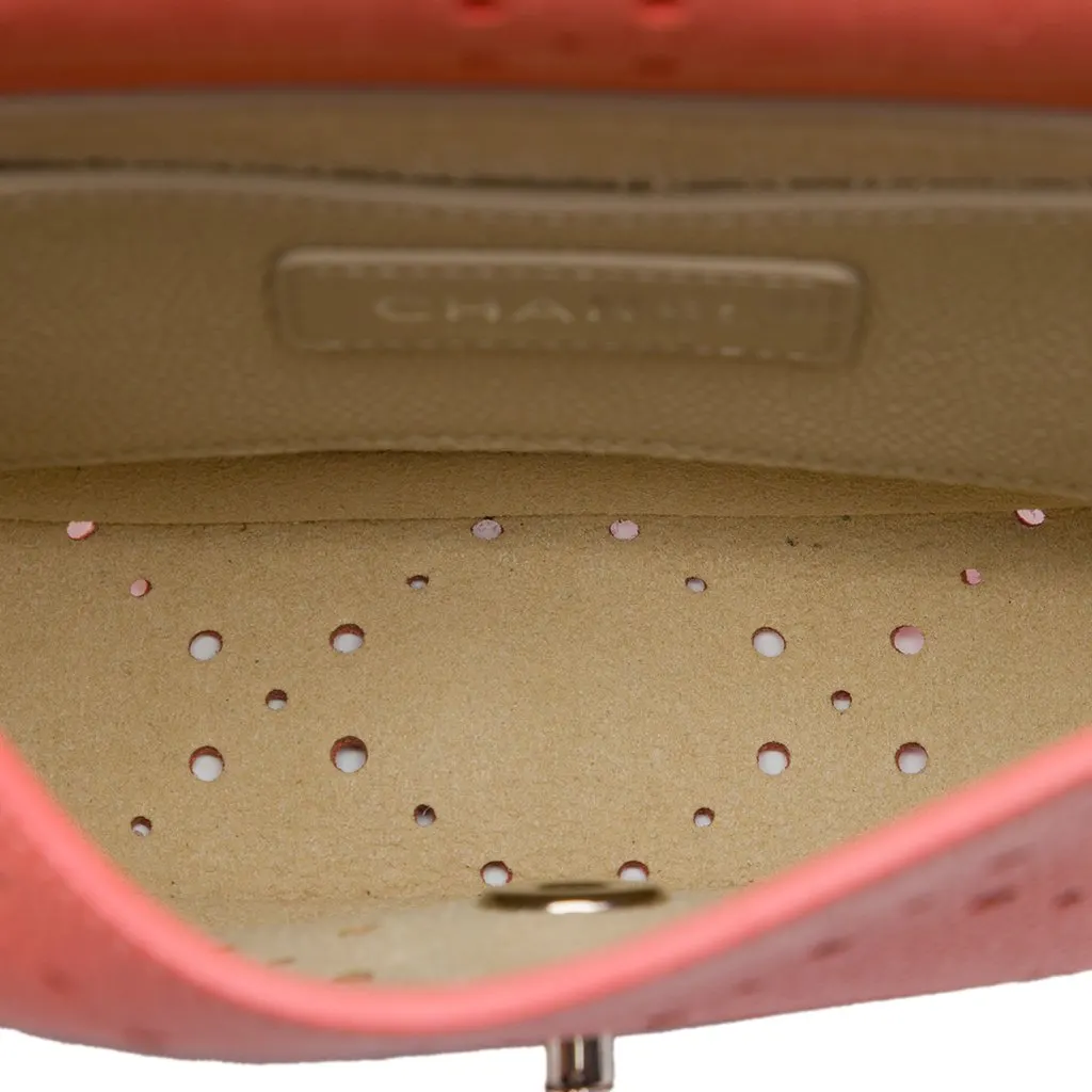 Chanel Small CC Perforated Caviar Messenger Flap Orange Leather Very good - Model View