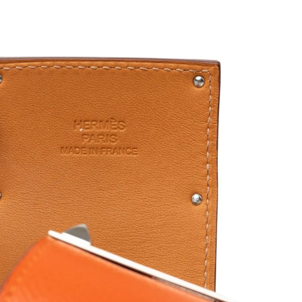 Hermès Epsom and Palladium Plated Kelly Extreme Dog Bracelet Orange Leather Very good - Box View