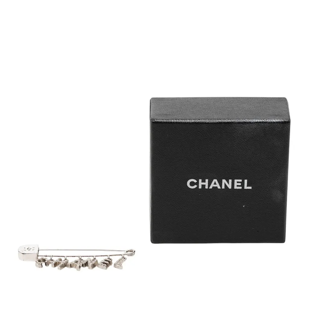 Chanel Brass and Strass Logo Letter Safety Pin Brooch Silver Metal Very good - Model View