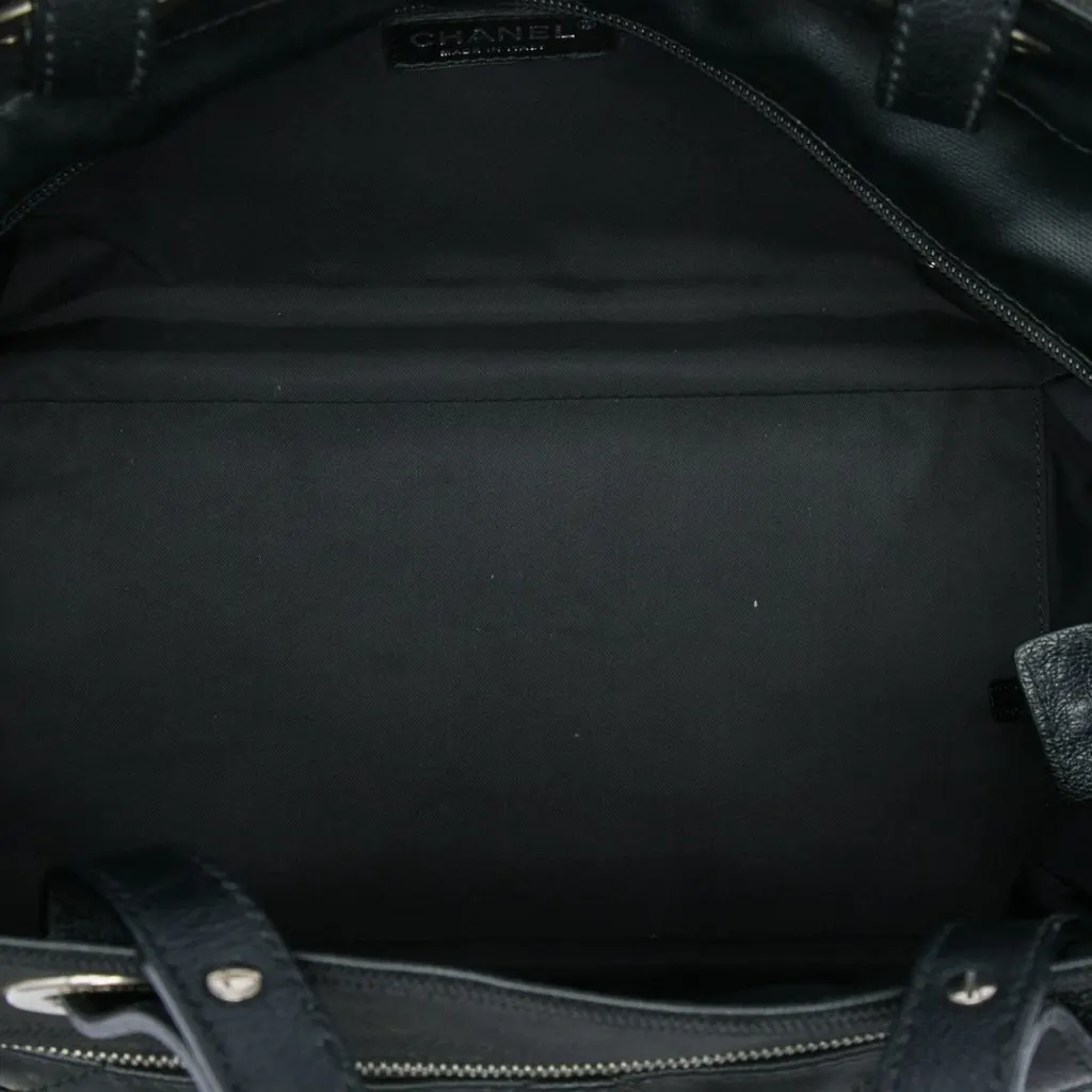 Chanel Paris Biarritz Large Quilted Coated Canvas and Nylon Tote Black Very good - Model View
