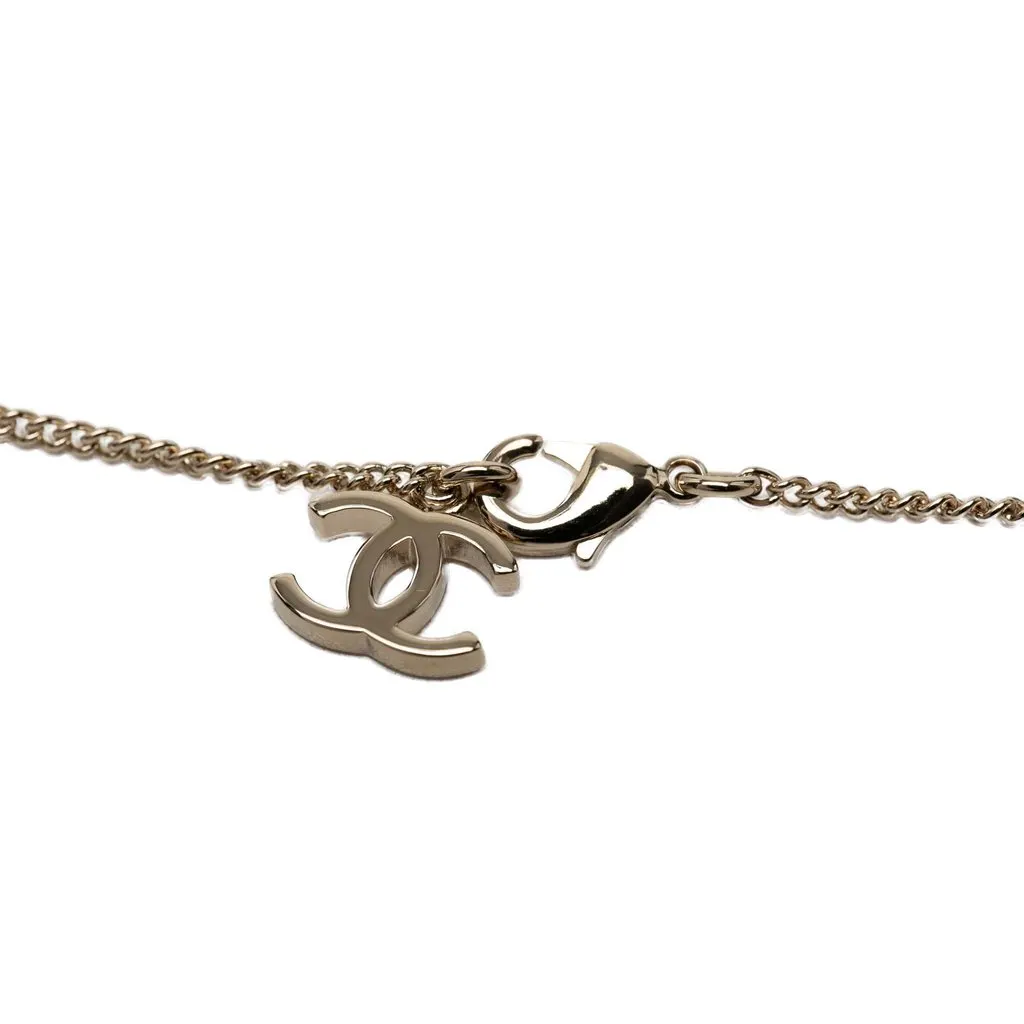 Chanel CC Gold Plated Faux Pearl and Strass Deer Pendant Necklace Gold Metal Very good - Inside View