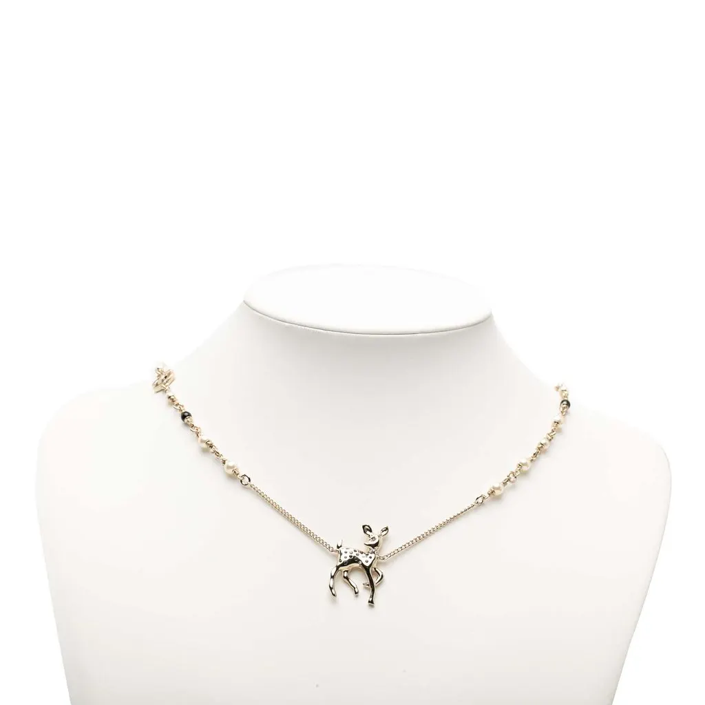 Chanel CC Gold Plated Faux Pearl and Strass Deer Pendant Necklace Gold Metal Very good - Box View