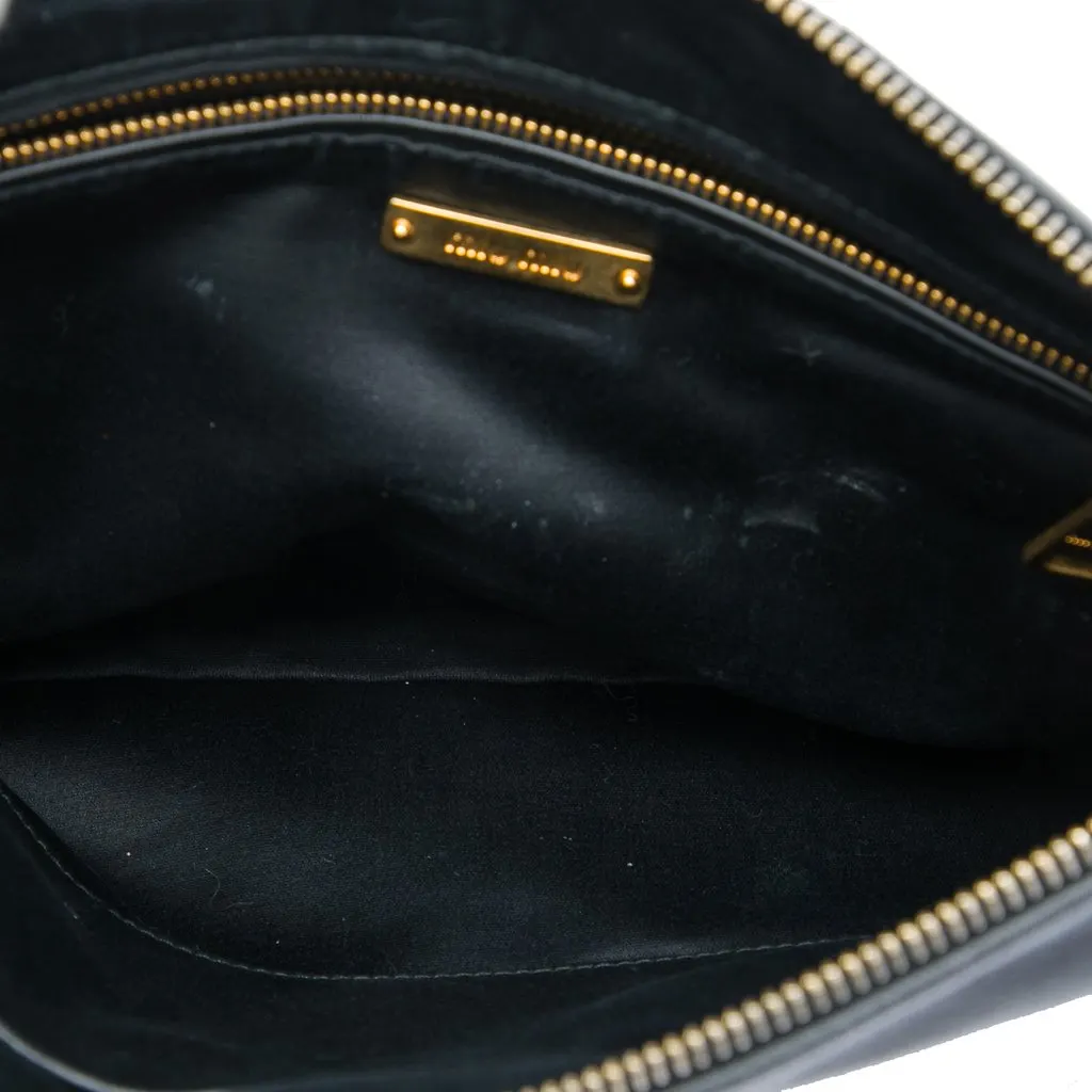 Miu Miu Studded Leather Zip Clutch Black Leather Very good - Model View