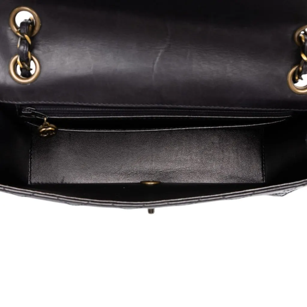 Chanel Medium CC Quilted Lambskin Single Flap Black Leather Good - Model View