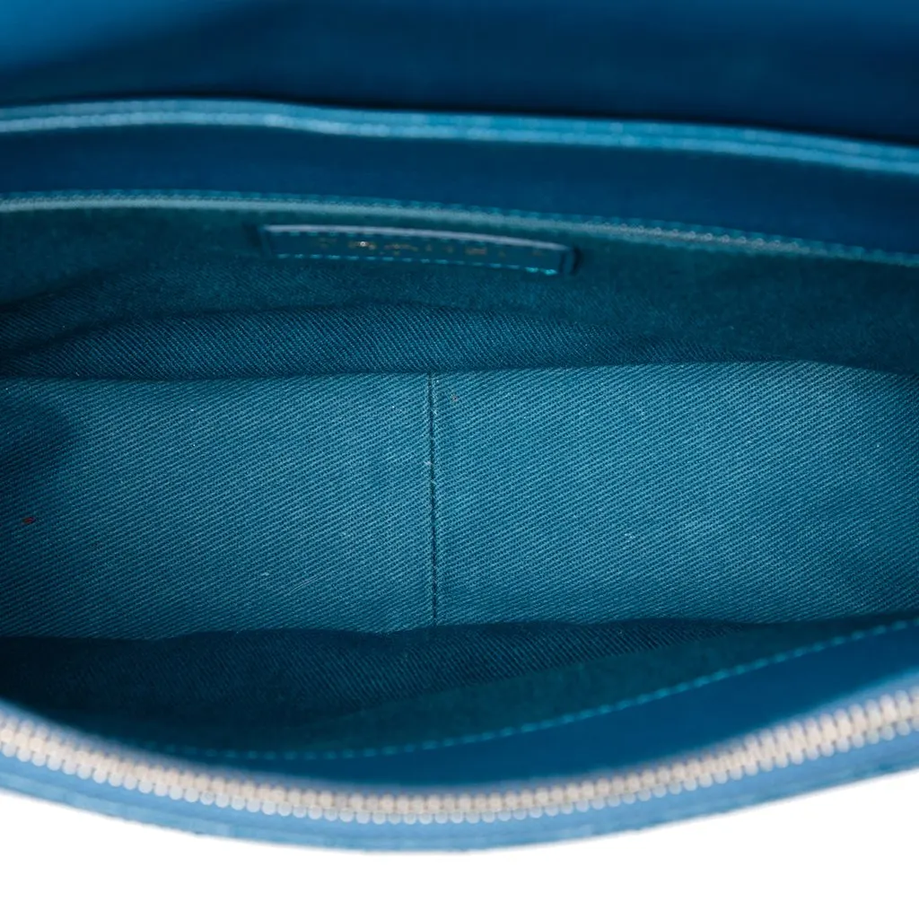 Chanel Medium Shiny Calfskin and Quilted Goatskin Coco Curve Flap Blue Leather Very good - Model View