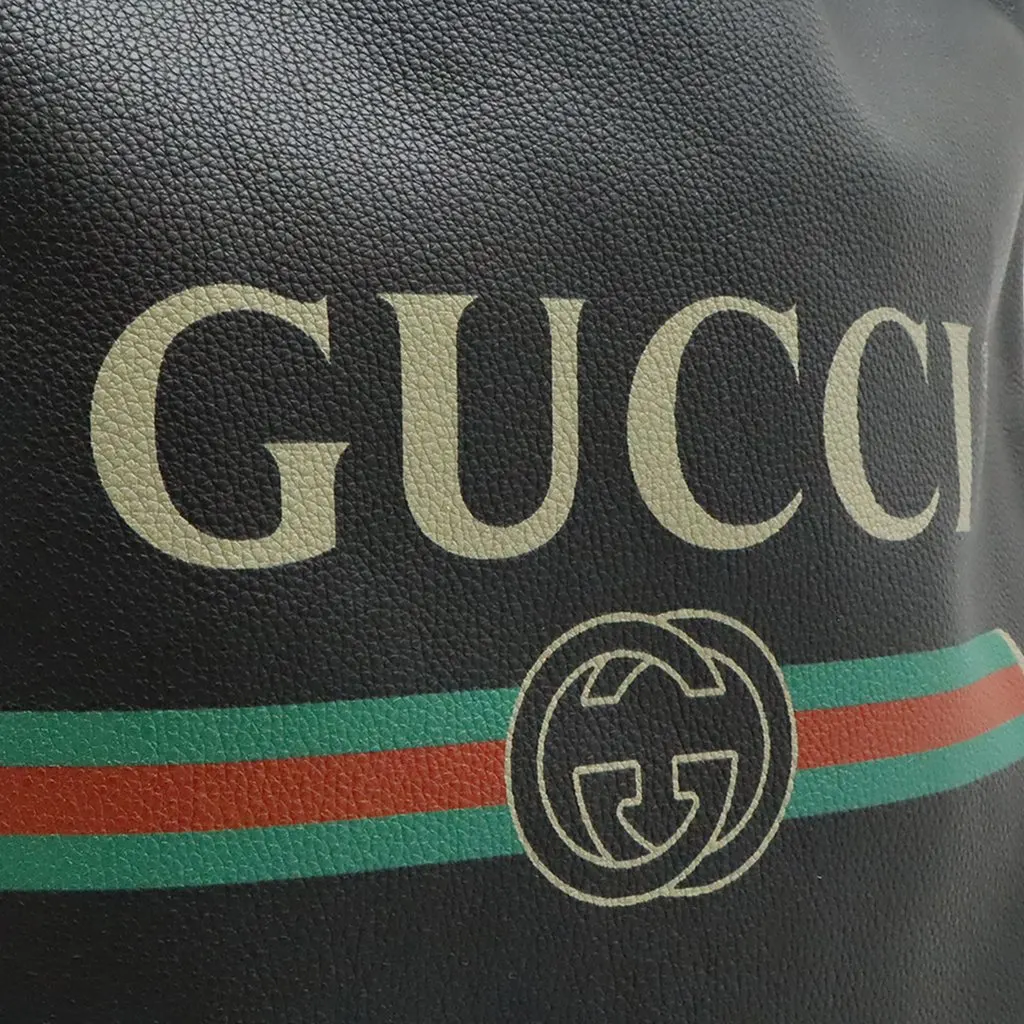 Gucci Grained Calfskin Web Logo Drawstring Backpack Black Leather Very good - Model View