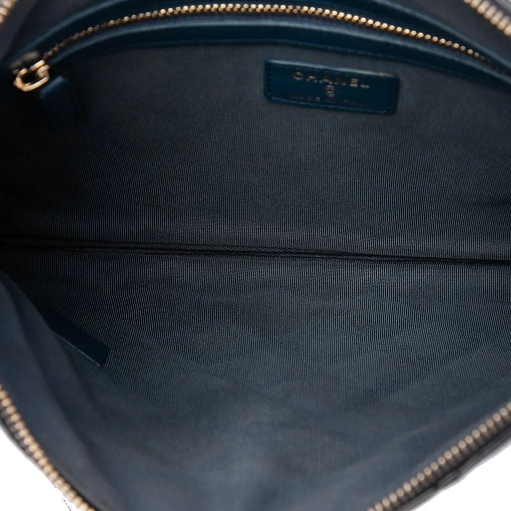Chanel Medium Quilted Patent O Case Clutch Black Leather Good - Model View