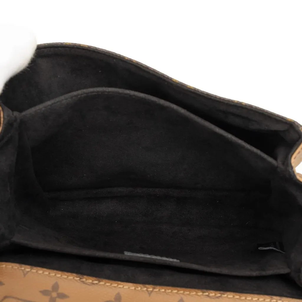 Louis Vuitton Monogram Reverse Pochette Metis Brown Very good - Model View