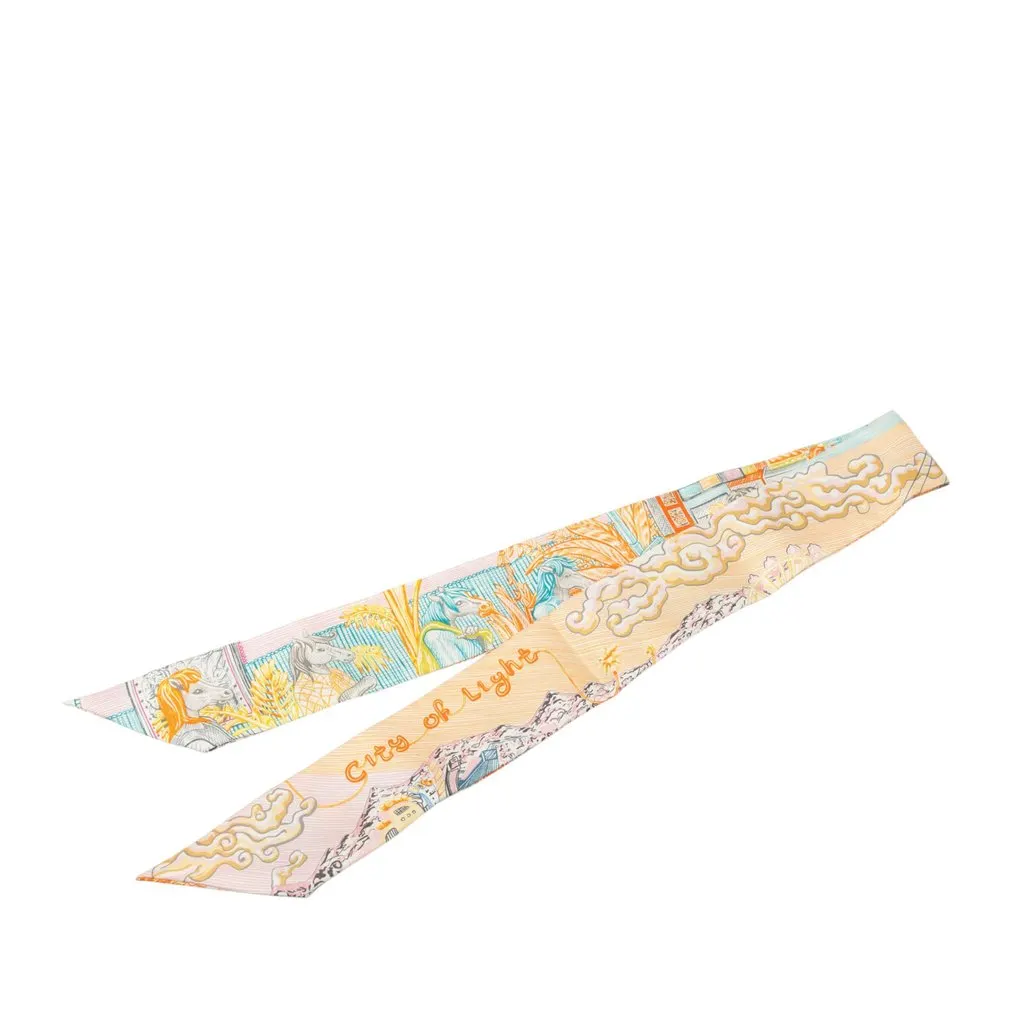 Hermès City of Light Silk Twilly Scarf Yellow Silk Never worn - Front View