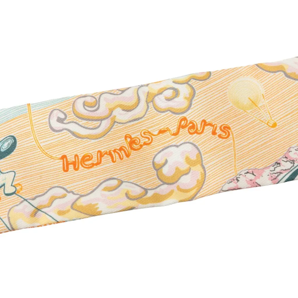 Hermès City of Light Silk Twilly Scarf Yellow Silk Never worn - Model View