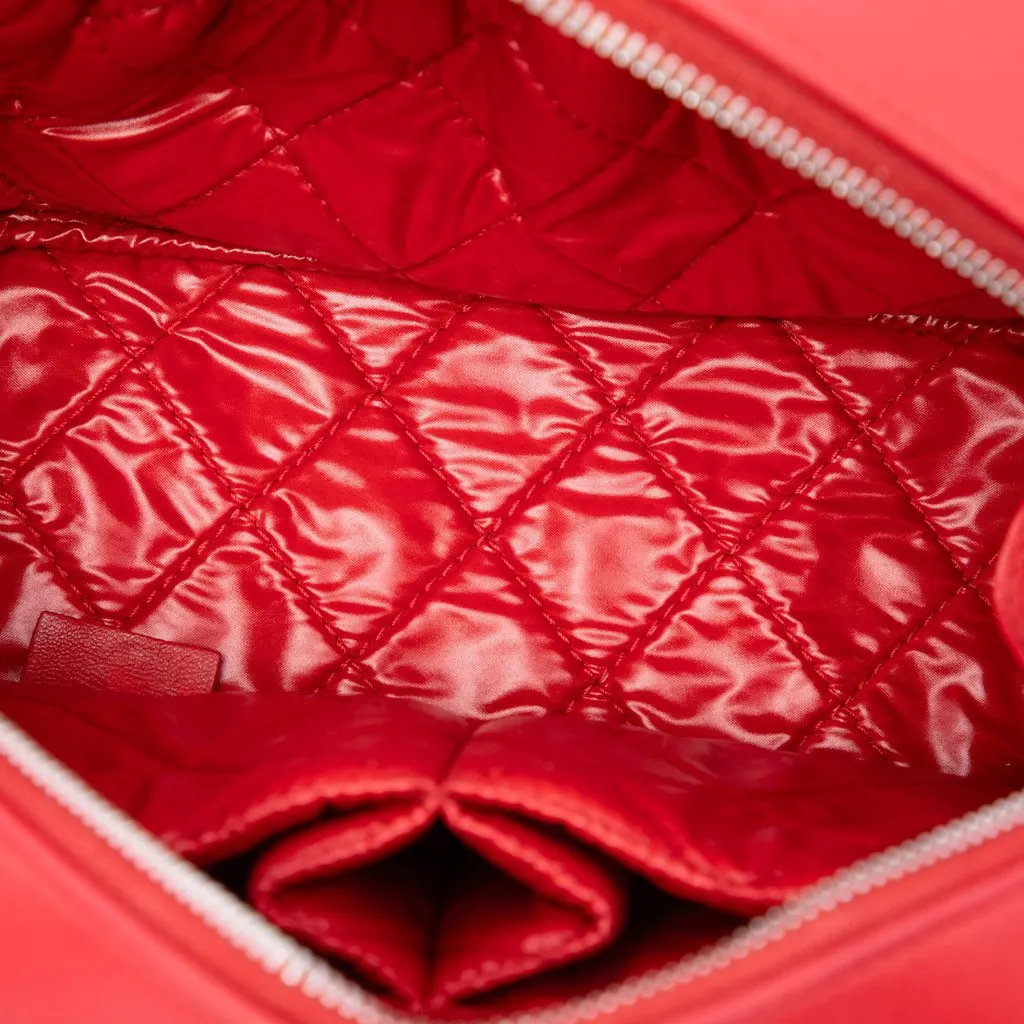 Chanel Medium CC Quilted Lambskin Curvy Cosmetic Pouch Red Leather Very good - Model View