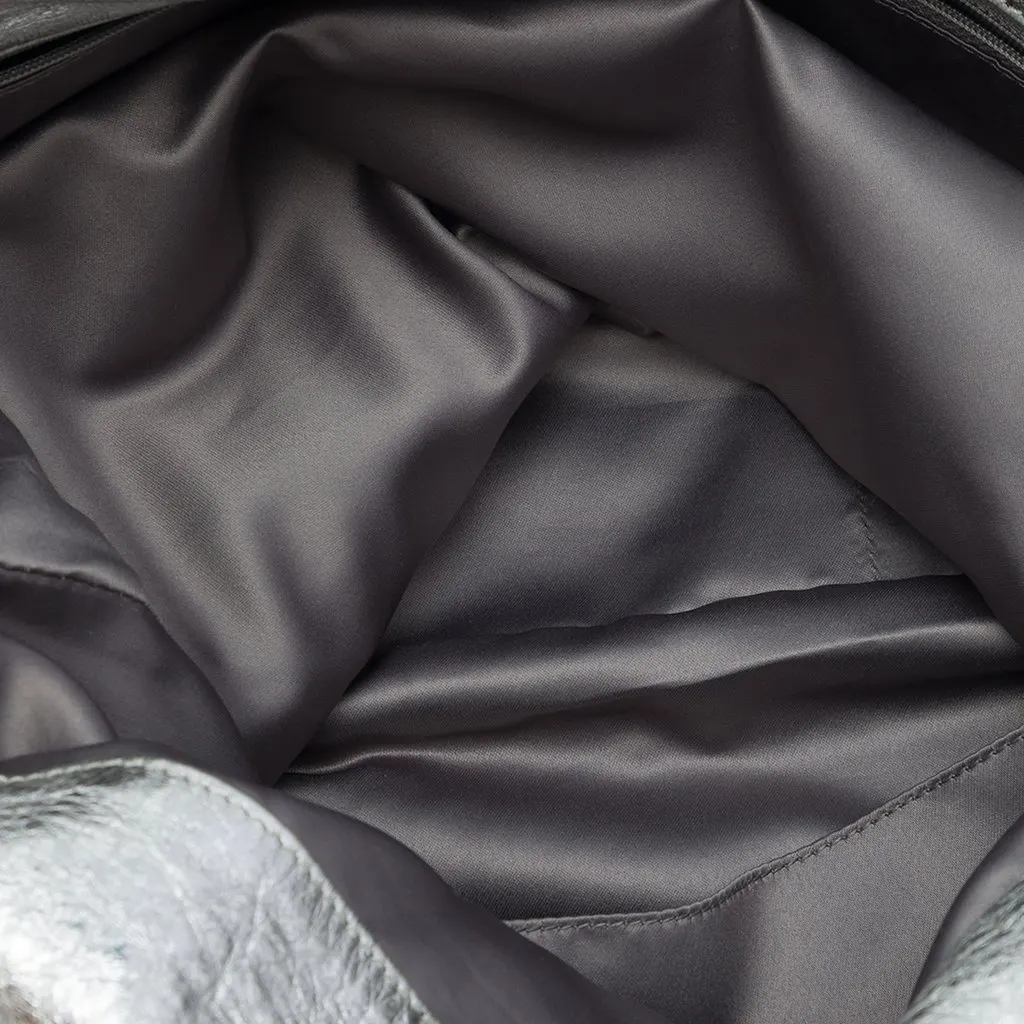 Chanel Large Metallic Glazed Calfskin Perforated Rodeo Drive Satchel Silver Leather Very good - Model View