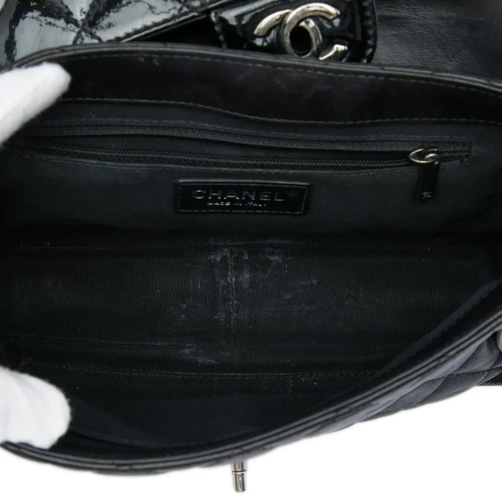 Chanel CC Quilted Lambskin and Patent Bijoux Chain Flap Black Leather Very good - Model View