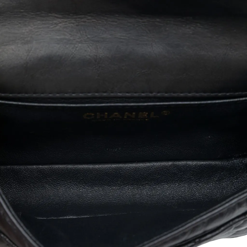 Chanel Quilted Aged Calfskin Reissue 2.55 Flap Belt Bag Black Leather Very good - Model View