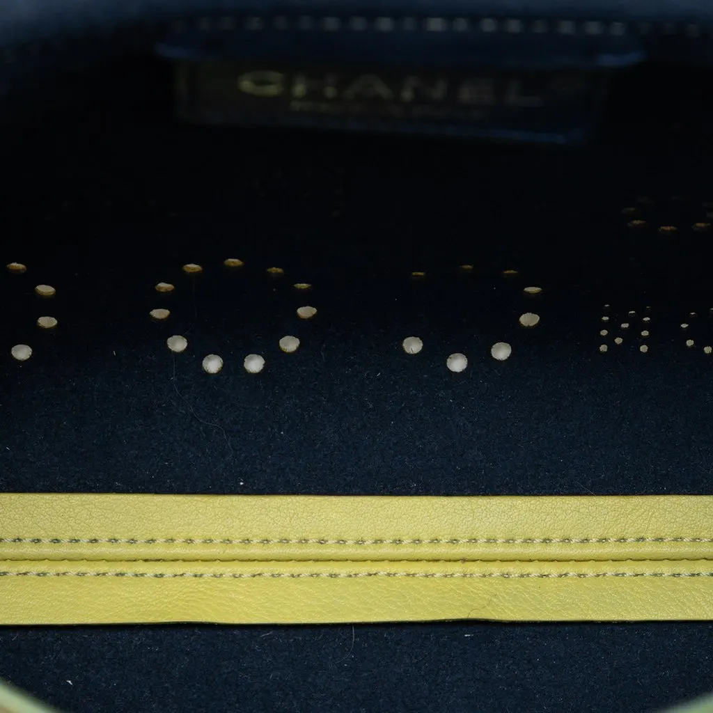 Chanel Perforated Calfskin Logo Eyelet Flap Yellow Leather Very good - Model View