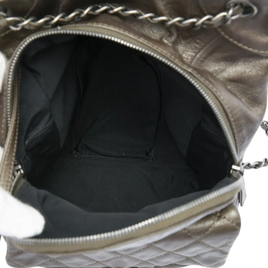 Chanel Small CC Metallic Calfskin Drawstring Flap Backpack Brown Leather Very good - Model View