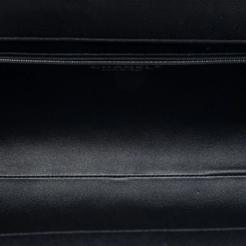 Chanel Large CC Quilted Caviar Frame Clutch Black Leather Very good - Model View
